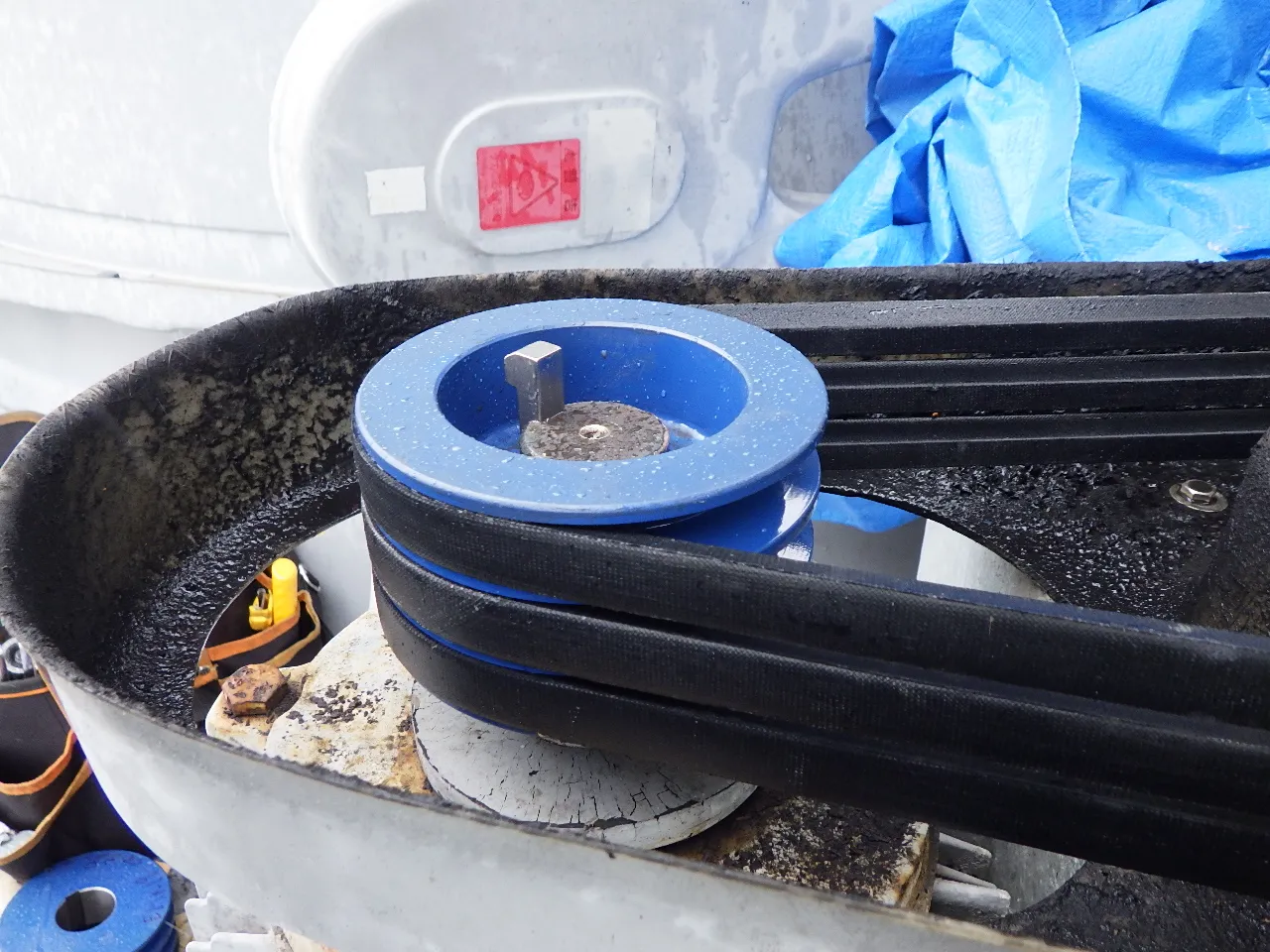 Drive belt pulley after maintenance — restored to like-new condition