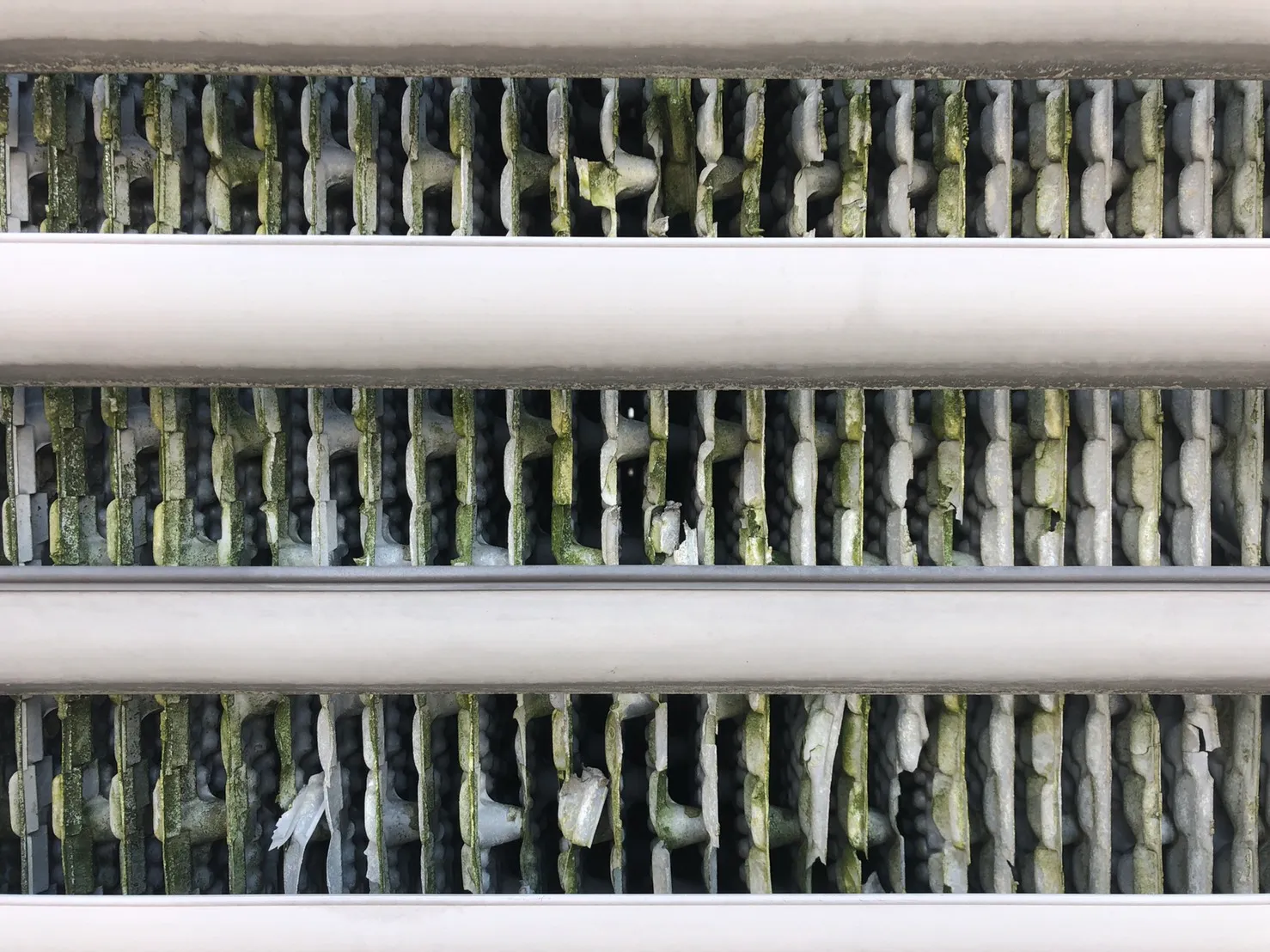 Scale-clogged fill media before heat exchanger replacement